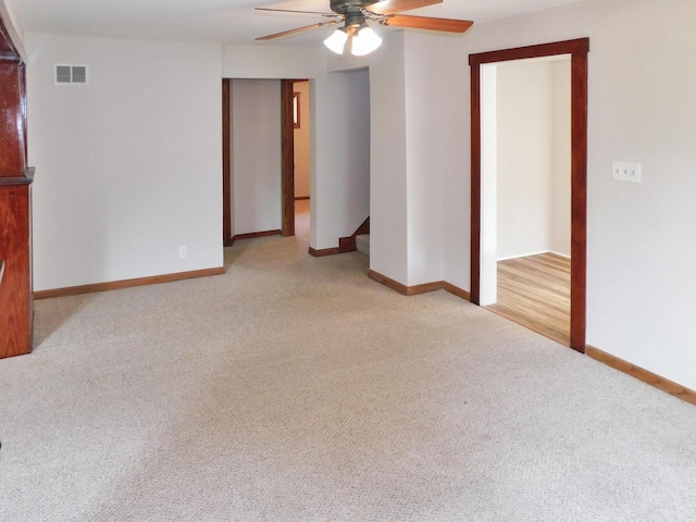 829 Blackhawk Blvd, South Beloit, IL 61080 - unfurnished room featuring ceiling fan, light carpet, and baseboards