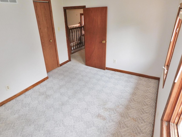 829 Blackhawk Blvd, South Beloit, IL 61080 - carpeted empty room featuring baseboards