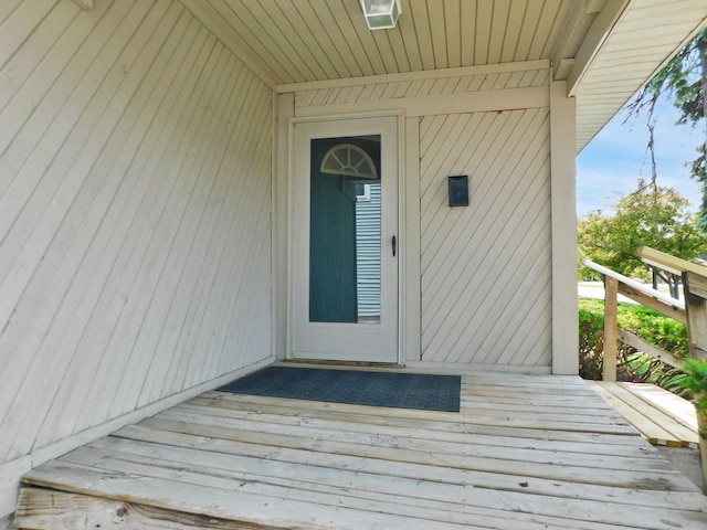 829 Blackhawk Blvd, South Beloit, IL 61080 - view of exterior entry featuring a wooden deck