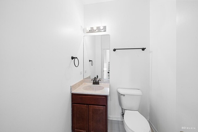 10651 Gabrielle Ln, Orland Park, IL 60462 - bathroom with toilet, vanity, and tile patterned floors