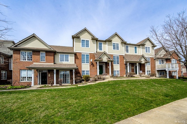 10651 Gabrielle Ln, Orland Park, IL 60462 - view of property featuring brick siding and a front yard