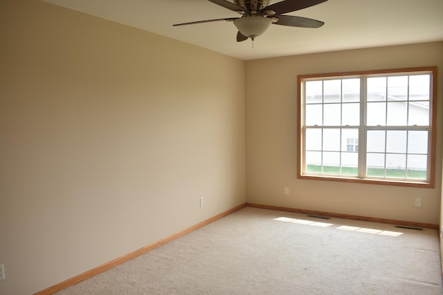 14635 Euclid St Unit D, Cedar Lake, IN 46303 - empty room featuring light colored carpet, baseboards, and a ceiling fan