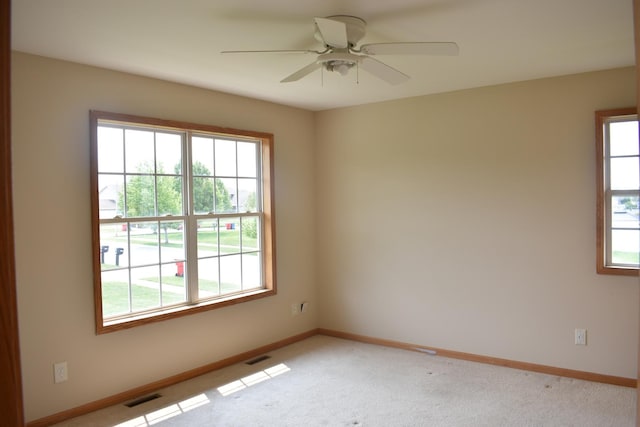 14635 Euclid St Unit D, Cedar Lake, IN 46303 - spare room with healthy amount of natural light, baseboards, and ceiling fan