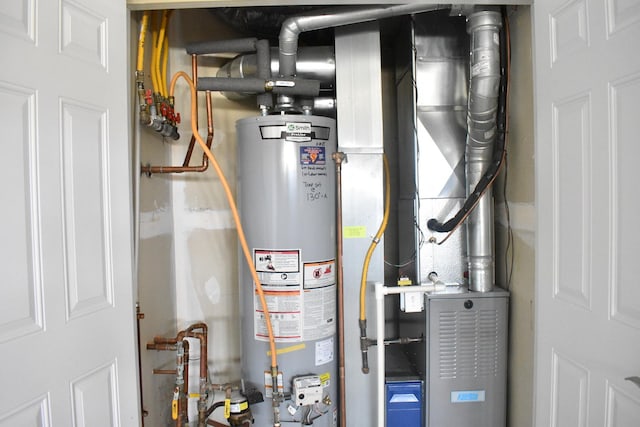14635 Euclid St Unit D, Cedar Lake, IN 46303 - utility room with gas water heater