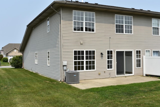 14635 Euclid St Unit D, Cedar Lake, IN 46303 - rear view of property with central AC unit, a yard, and a patio area