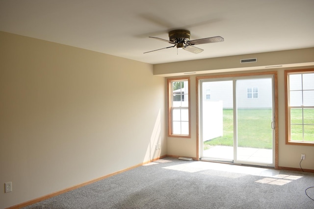 14635 Euclid St Unit D, Cedar Lake, IN 46303 - carpeted spare room with baseboards and a ceiling fan