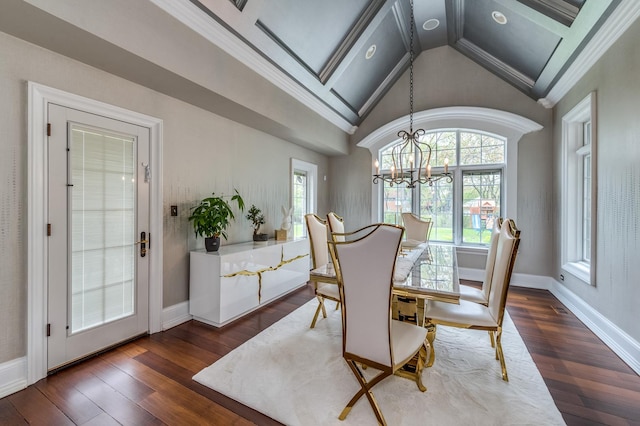217 Haman Rd, Inverness, IL 60010 - dining room with a chandelier, healthy amount of natural light, lofted ceiling, dark wood-type flooring, and ornamental molding