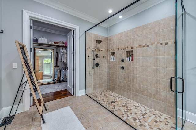 217 Haman Rd, Inverness, IL 60010 - bathroom featuring ornamental molding, a shower stall, baseboards, a walk in closet, and recessed lighting