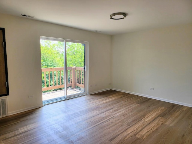 2238 Abbeywood Dr Unit C, Lisle, IL 60532 - empty room with wood finished floors and baseboards