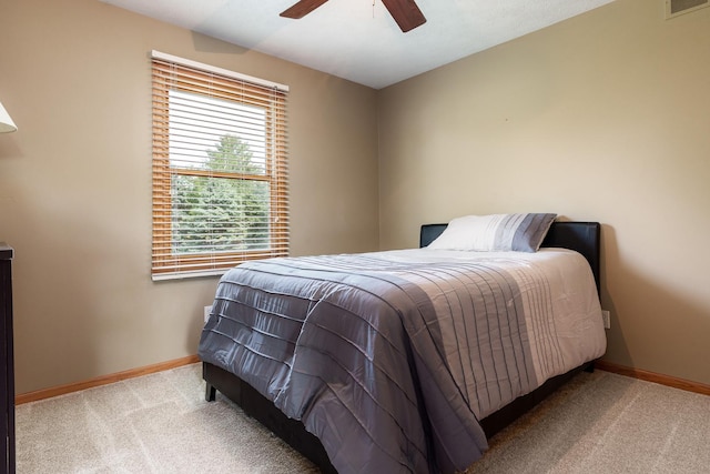 5804 Targee Trl, Roscoe, IL 61073 - carpeted bedroom with baseboards and ceiling fan