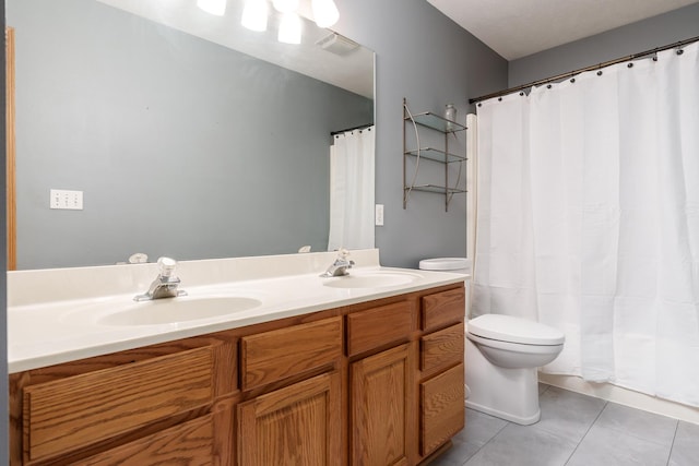 5804 Targee Trl, Roscoe, IL 61073 - full bathroom with toilet, tile patterned floors, and double vanity