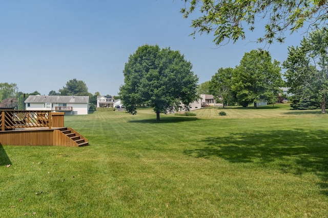 5804 Targee Trl, Roscoe, IL 61073 - view of green lawn featuring a deck