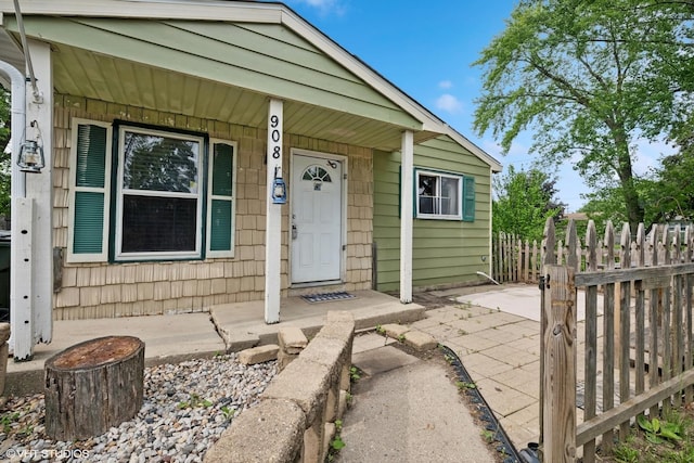 908 Diana Ct, Round Lake Beach, IL 60073 - view of exterior entry featuring a porch
