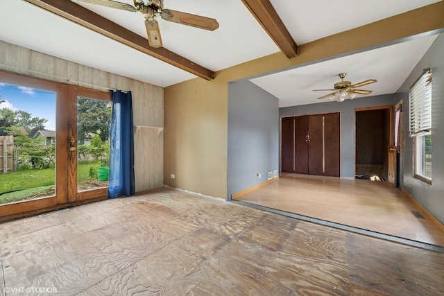 908 Diana Ct, Round Lake Beach, IL 60073 - unfurnished living room featuring ceiling fan and beamed ceiling