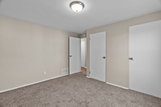 7832 Main St, Walsh, IL 62297 - unfurnished bedroom with carpet flooring and baseboards