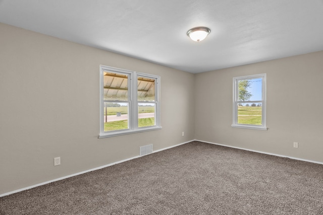 7832 Main St, Walsh, IL 62297 - empty room featuring carpet and baseboards