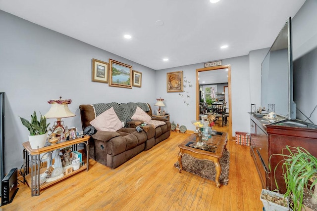 4926 S Winchester Ave, Chicago, IL 60609 - living area featuring wood finished floors and recessed lighting