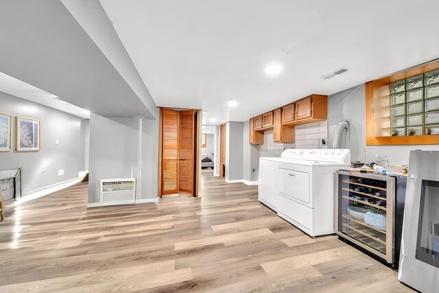4926 S Winchester Ave, Chicago, IL 60609 - kitchen featuring light wood finished floors, baseboards, light countertops, and brown cabinets