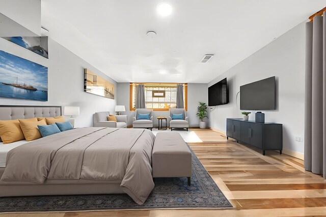 4926 S Winchester Ave, Chicago, IL 60609 - bedroom featuring light wood-style floors and baseboards