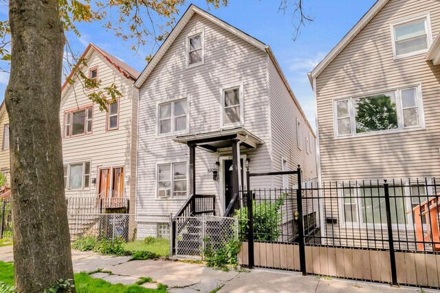4926 S Winchester Ave, Chicago, IL 60609 - view of front of property featuring a fenced front yard