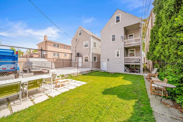 4926 S Winchester Ave, Chicago, IL 60609 - rear view of property featuring a patio