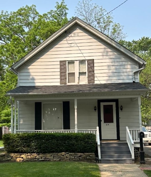 614 Oak Ave, Aurora, IL 60506 - bungalow-style home with a porch