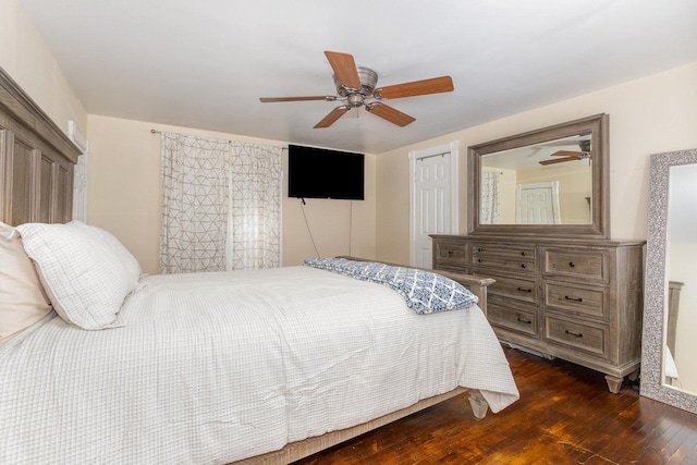 614 Oak Ave, Aurora, IL 60506 - bedroom with dark wood-type flooring, a ceiling fan, and a closet