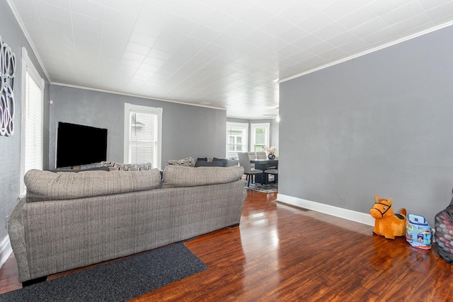 614 Oak Ave, Aurora, IL 60506 - living room with ornamental molding, wood finished floors, and baseboards