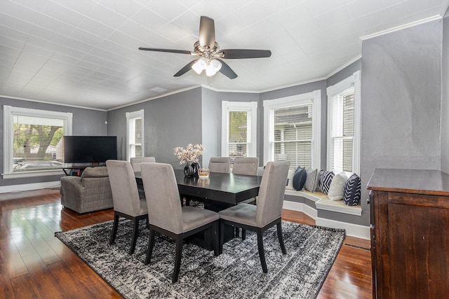 614 Oak Ave, Aurora, IL 60506 - dining area with ornamental molding, wood-type flooring, ceiling fan, and baseboards