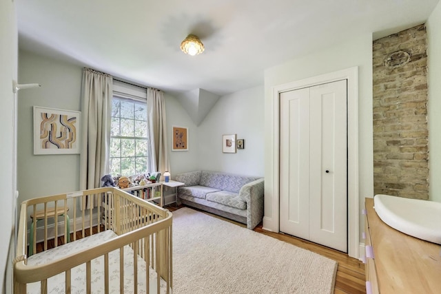 3719 W Shakespeare Ave, Chicago, IL 60647 - bedroom with wood finished floors and a closet