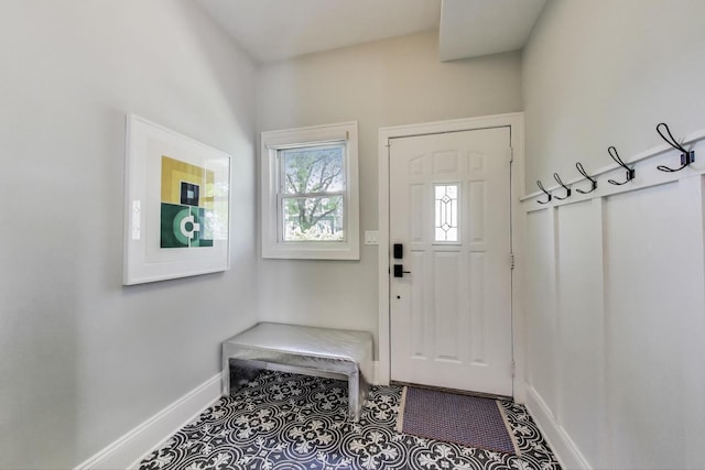 3719 W Shakespeare Ave, Chicago, IL 60647 - mudroom featuring baseboards and tile patterned floors