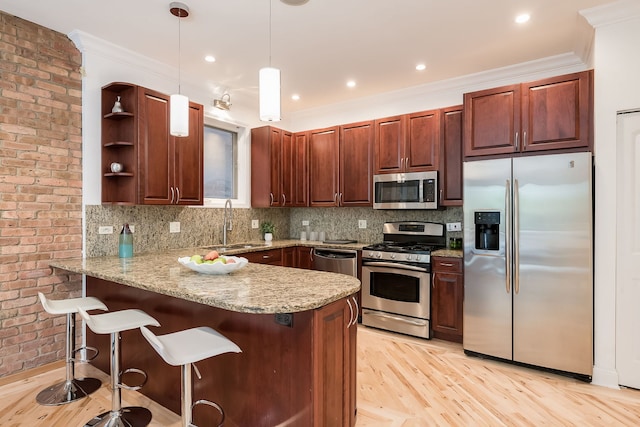 2433 W Haddon Ave Unit 1E, Chicago, IL 60622 - kitchen with appliances with stainless steel finishes, open shelves, a peninsula, pendant lighting, and backsplash