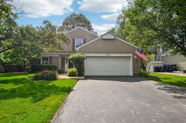 2313 Modaff Rd, Naperville, IL 60565 - traditional-style home with driveway, a garage, a front lawn, and a chimney