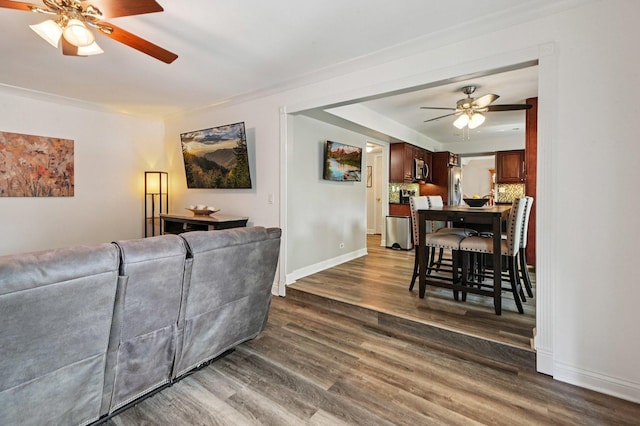 2313 Modaff Rd, Naperville, IL 60565 - living room featuring ceiling fan, dark wood-style floors, and baseboards