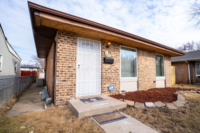 14117 S Calhoun Ave, Burnham, IL 60633 - entrance to property featuring brick siding and cooling unit
