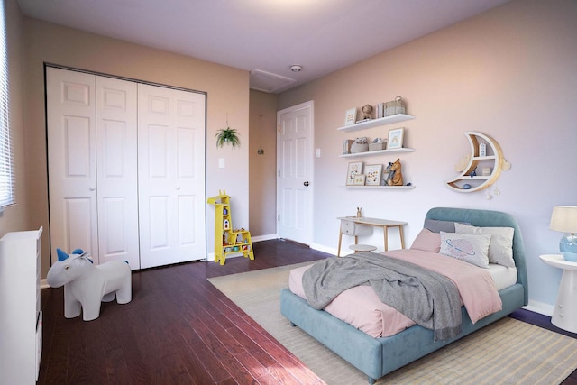 14117 S Calhoun Ave, Burnham, IL 60633 - bedroom with wood finished floors, a closet, and baseboards