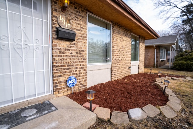 14117 S Calhoun Ave, Burnham, IL 60633 - property entrance featuring brick siding