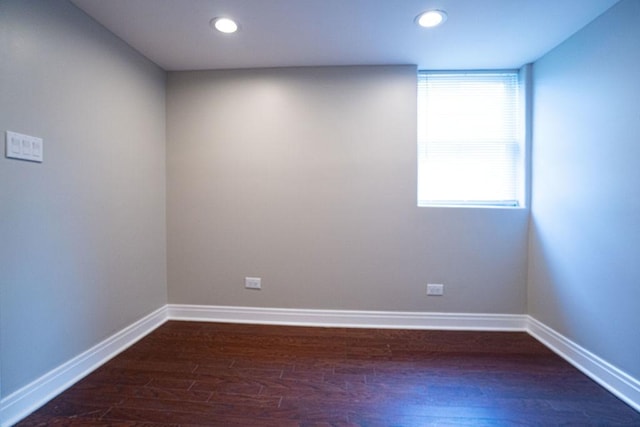 14117 S Calhoun Ave, Burnham, IL 60633 - empty room featuring dark wood-style floors, baseboards, and recessed lighting