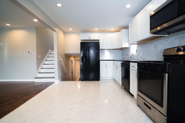 14117 S Calhoun Ave, Burnham, IL 60633 - kitchen with black appliances, recessed lighting, white cabinets, backsplash, and baseboards