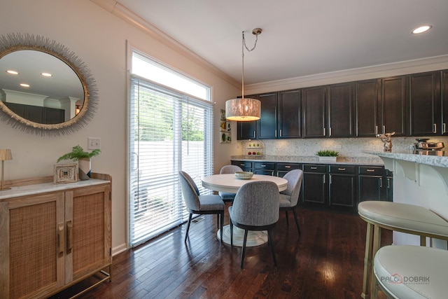 769 N Winchester Dr, Palatine, IL 60067 - dining space with ornamental molding, dark wood-style flooring, recessed lighting, and baseboards