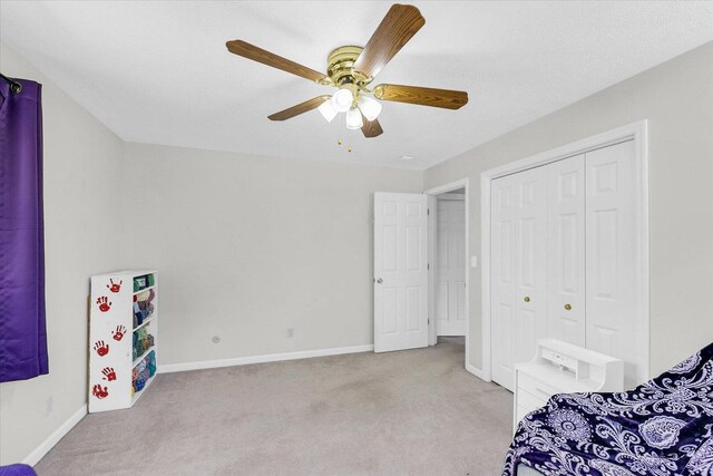 1803 Galena St, Urbana, IL 61802 - unfurnished bedroom featuring light colored carpet, a ceiling fan, and a closet