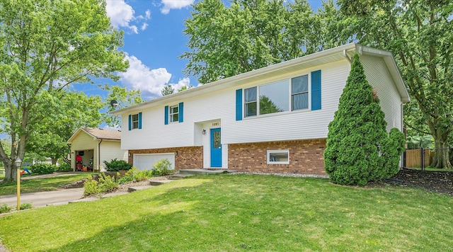 1803 Galena St, Urbana, IL 61802 - raised ranch featuring an attached garage and brick siding
