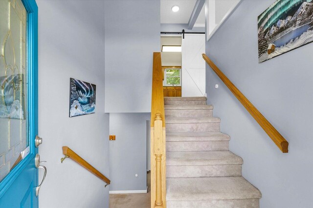 1803 Galena St, Urbana, IL 61802 - stairs with a barn door and carpet floors
