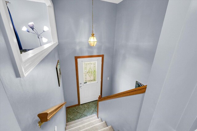 1803 Galena St, Urbana, IL 61802 - tiled foyer entrance featuring baseboards and stairway