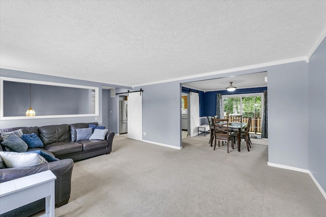 1803 Galena St, Urbana, IL 61802 - living area with a barn door, a textured ceiling, carpet floors, and crown molding