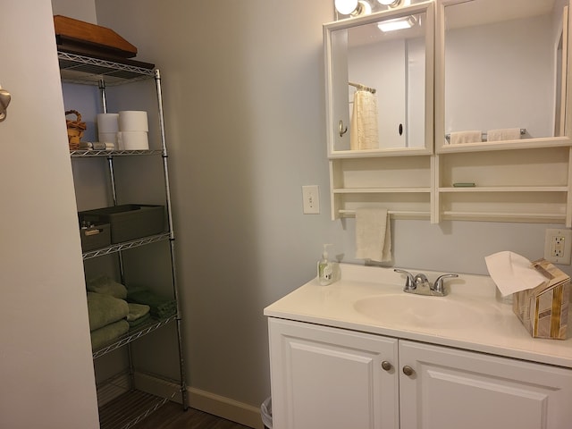 100 Watson Ave, Oglesby, IL 61348 - full bath featuring vanity and wood finished floors