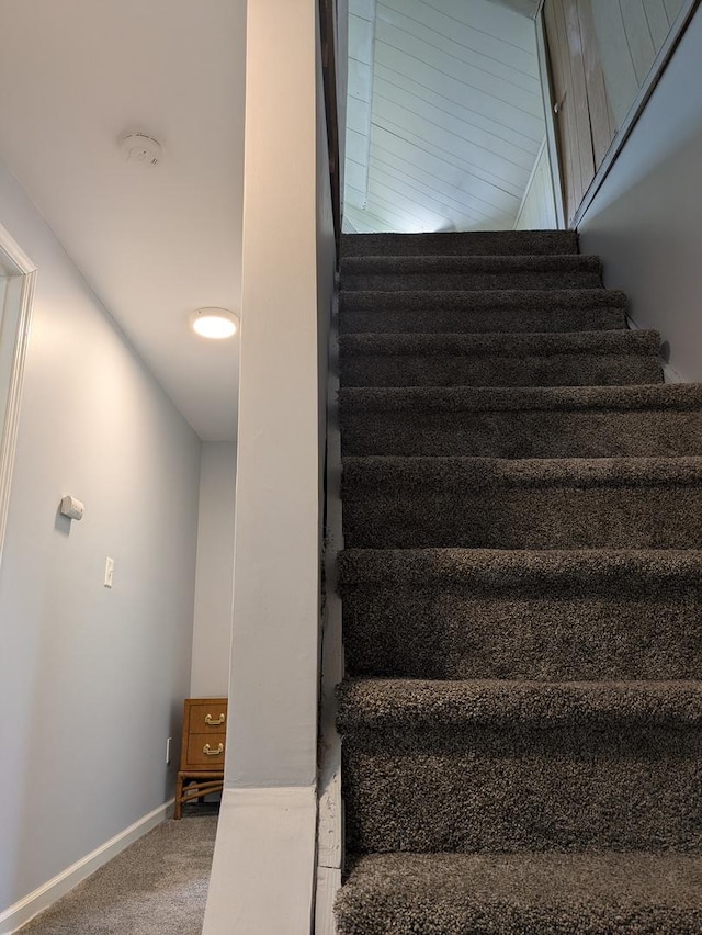 100 Watson Ave, Oglesby, IL 61348 - staircase featuring carpet floors and baseboards