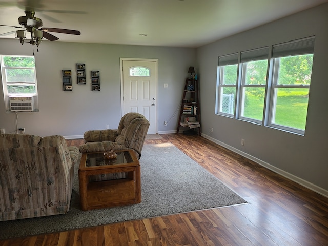 100 Watson Ave, Oglesby, IL 61348 - living area featuring healthy amount of natural light, baseboards, cooling unit, and a ceiling fan