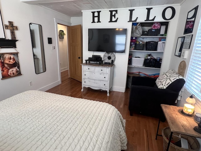 806 N Elizabeth St, Clinton, IL 61727 - bedroom with wood finished floors, baseboards, and wooden ceiling