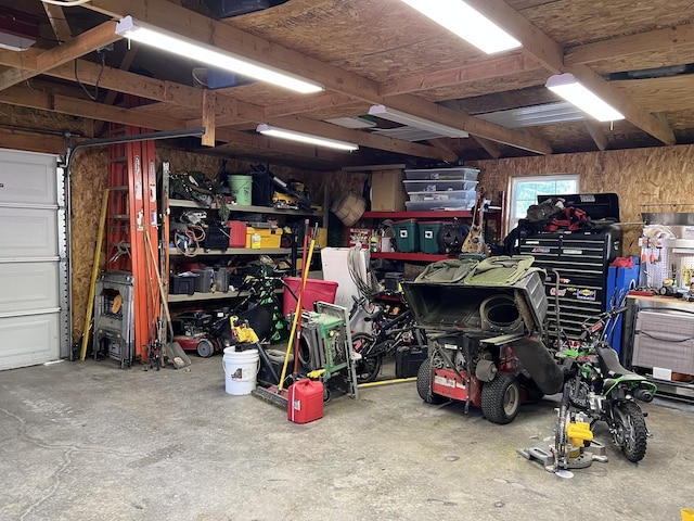 806 N Elizabeth St, Clinton, IL 61727 - garage featuring a workshop area